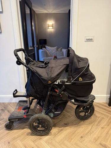 Out about carry cot - out, n